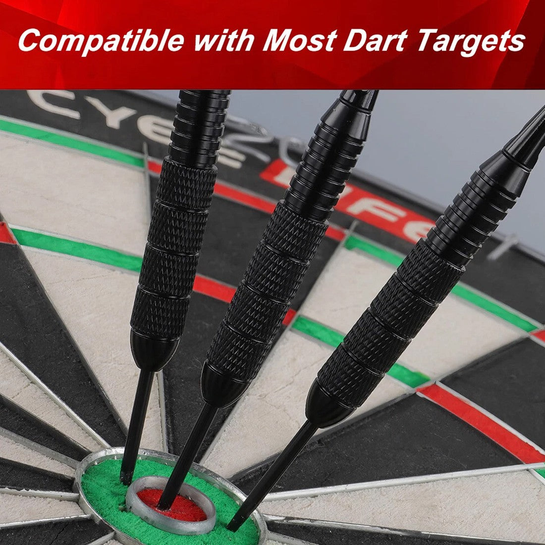 Three steel tip darts in the bullseye of a bristle dartboard