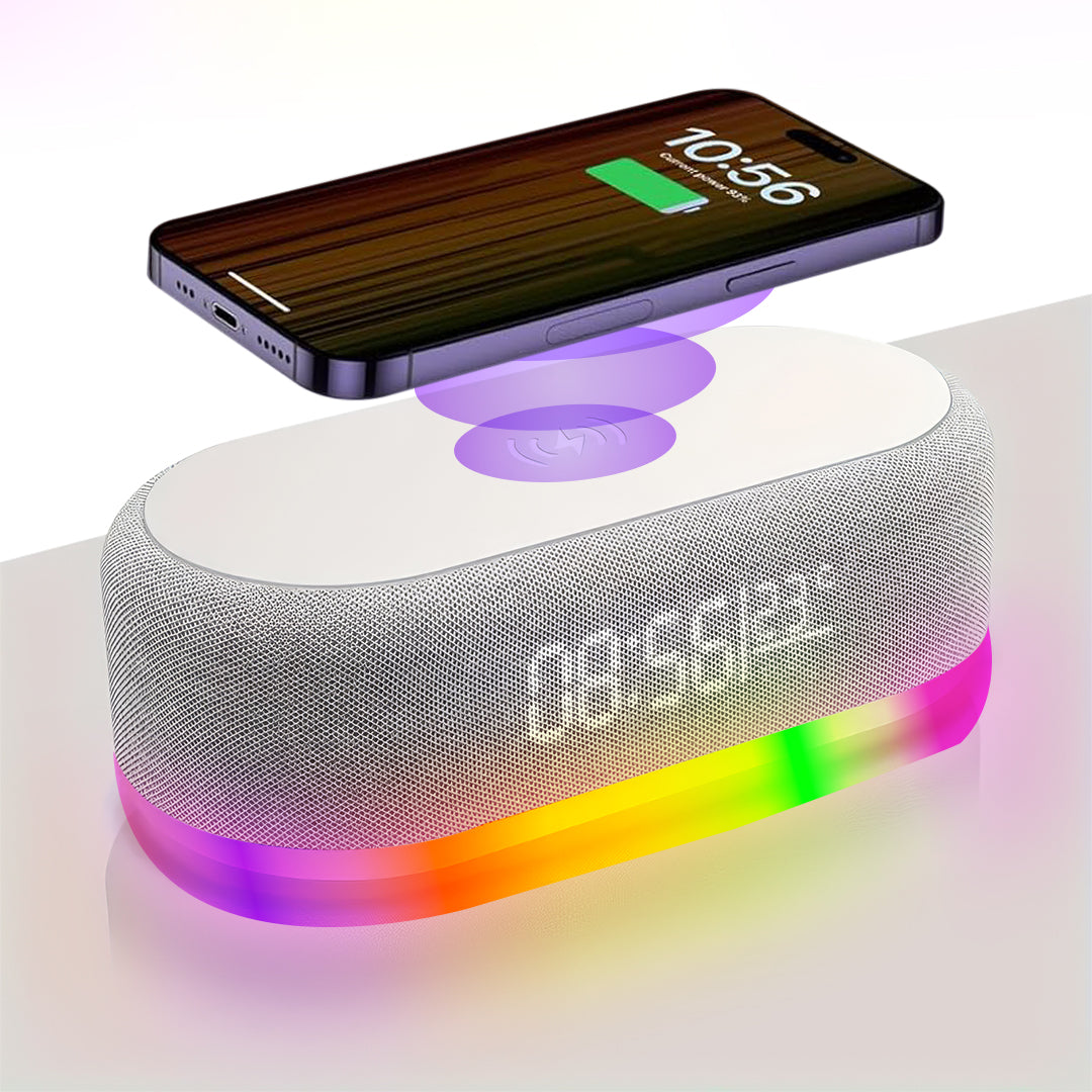 Grey speaker alarm clock wirelessly charging a phone, with rainbow light base