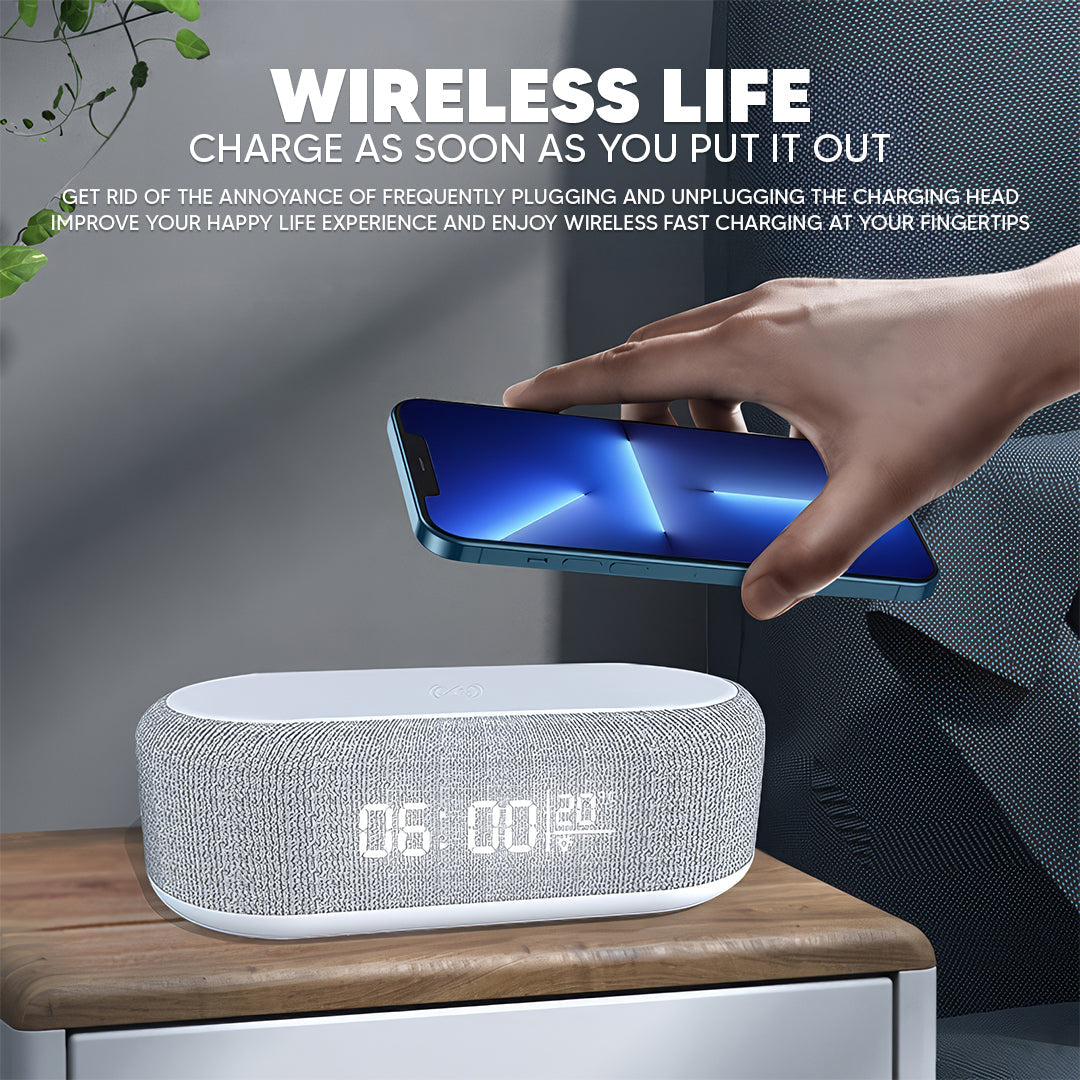 Hand placing a phone on the alarm clock wireless charger