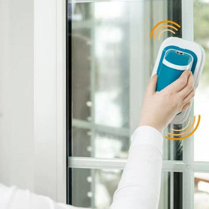 Cordless electric scrubber cleaning a window