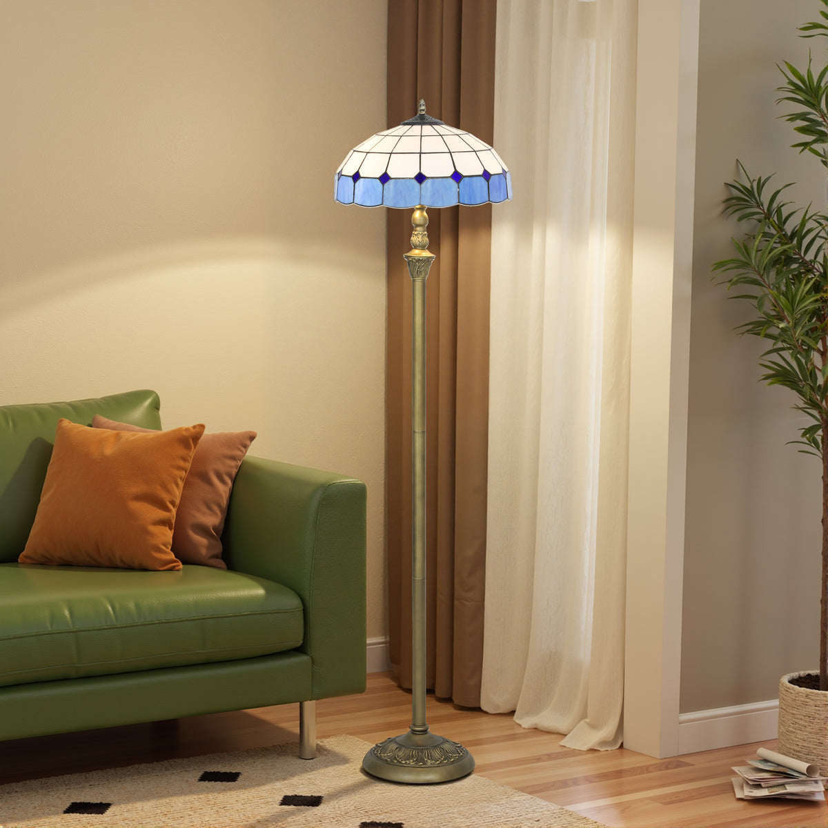 Tiffany-style floor lamp beside a green sofa